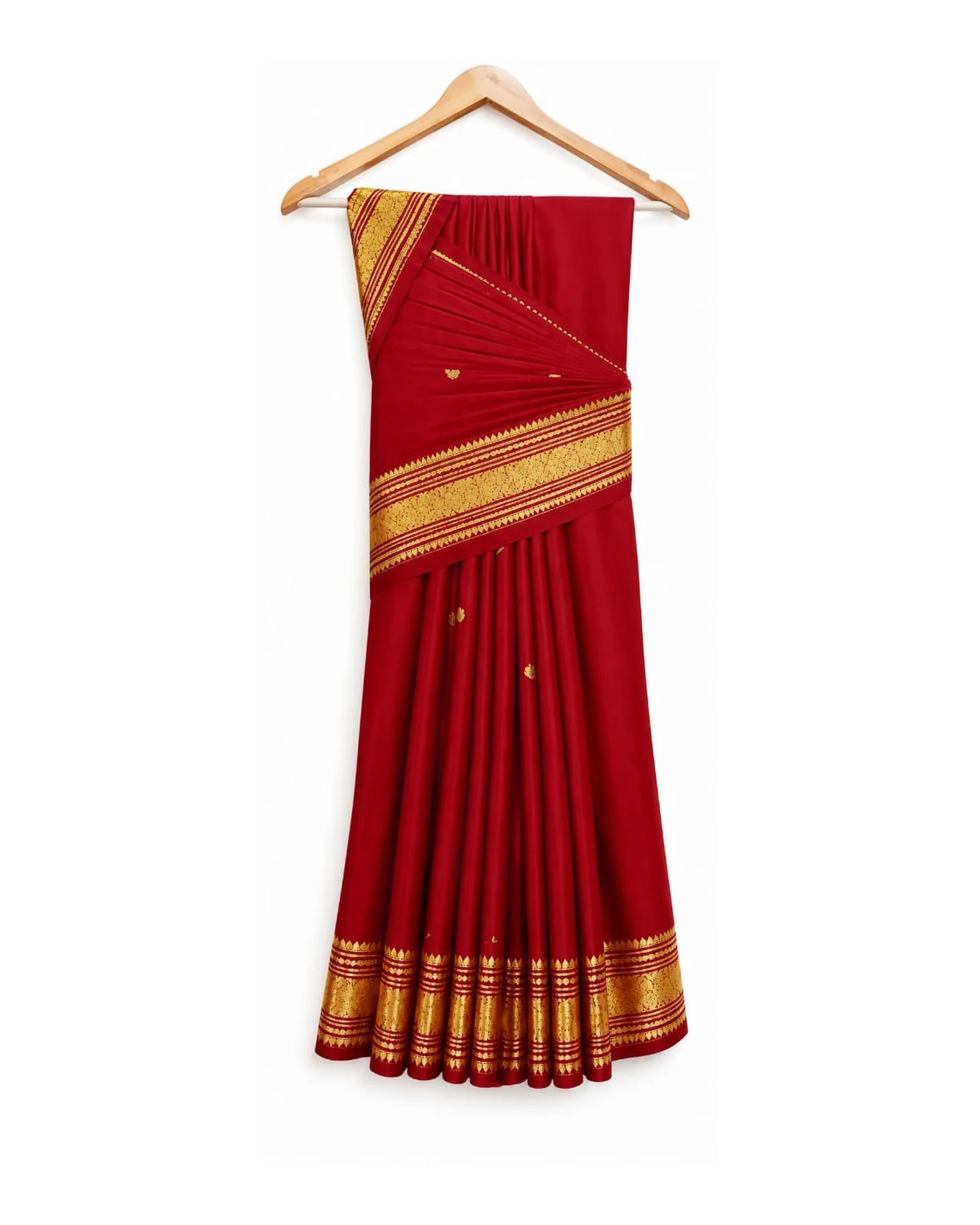 Demo photo: a fully pleated silk saree with very full voluminous fluffy pleats hanging on a wooden hanger